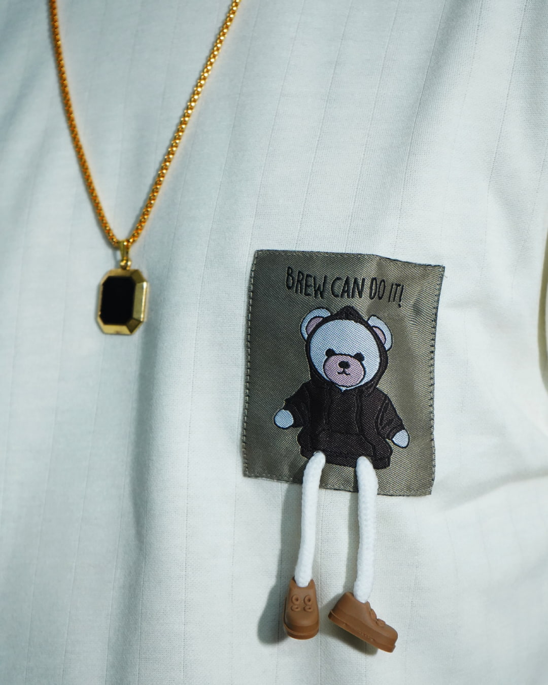 Oversized off-white t-shirt with bear patch for men and women – ₹799 – Artist Gully